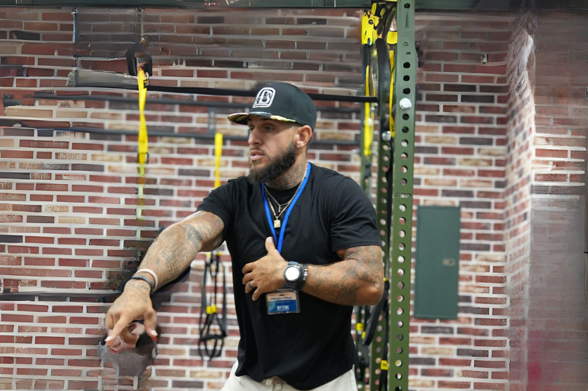 Fitness coach guiding therapy-based exercise session for addiction recovery support.