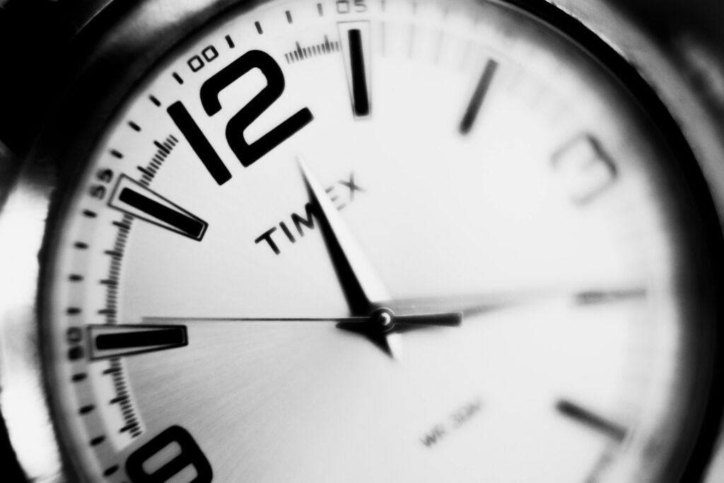 Close up of a clock symbolizing how long Fresno addiction treatment takes.