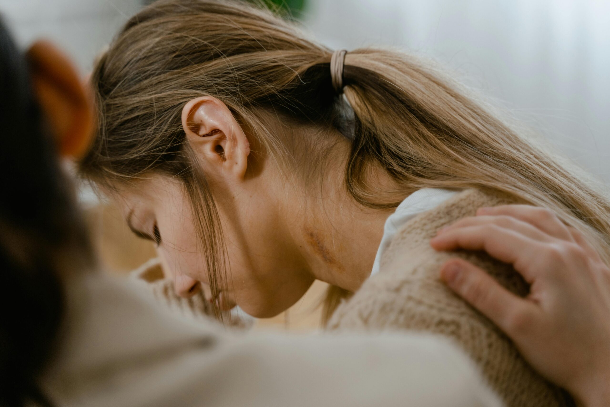 Young woman receiving emotional support during counseling at an addiction treatment program in Fresno focused on mental health, healing, and recovery.